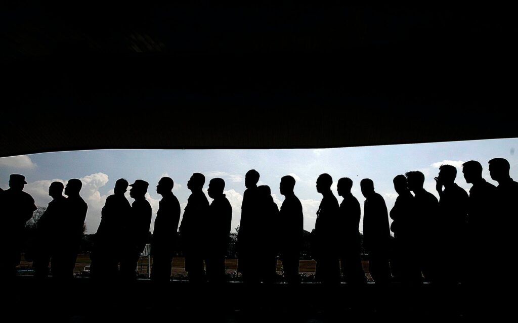 group of men forming a line