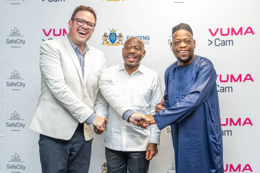 VumaCam's Michael Varney, Gauteng e-Goverent MEC Bonginkosi Dhlamini and HOD Castro Musina pose for a picture