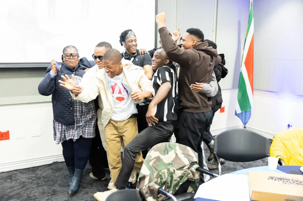 The Gridwise 10X team celebrating after being announcement as the winners of the G13 YTE Hackathon